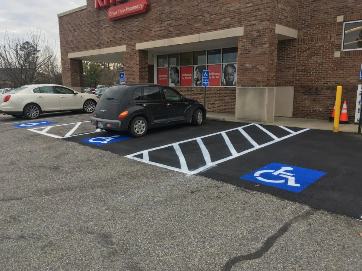 Before condition of weathered commercial asphalt lot in Central Virginia
